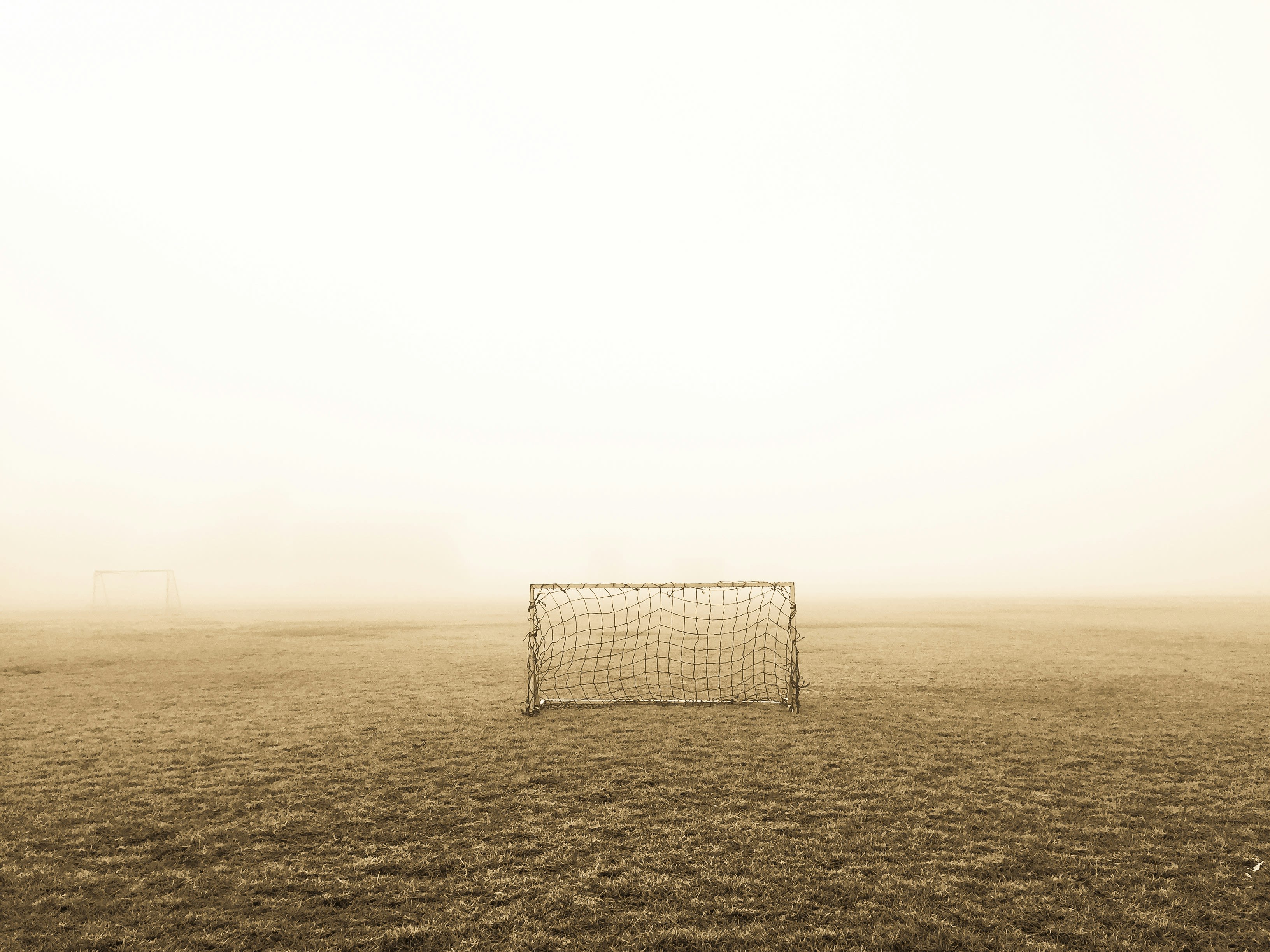 person standing on football field